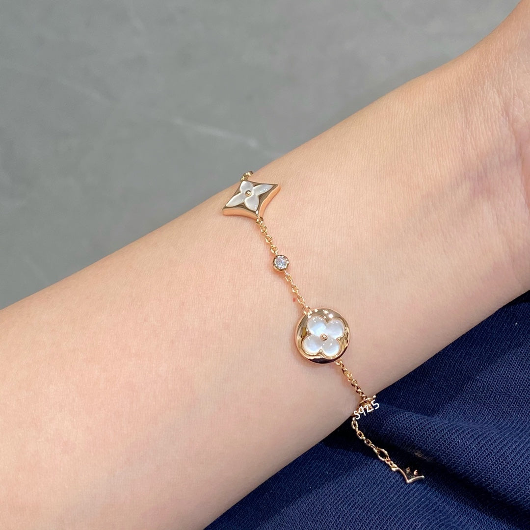 [Luxe]STAR AND SUN 4 MOTIF WHITE MOP PINK GOLD BRACELET